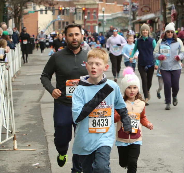 kids and people in the running race