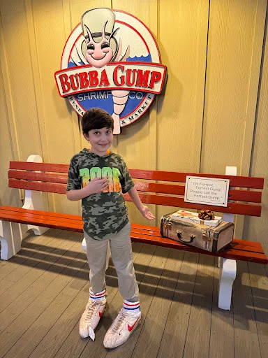 boy at the "bubba gump" restaurant