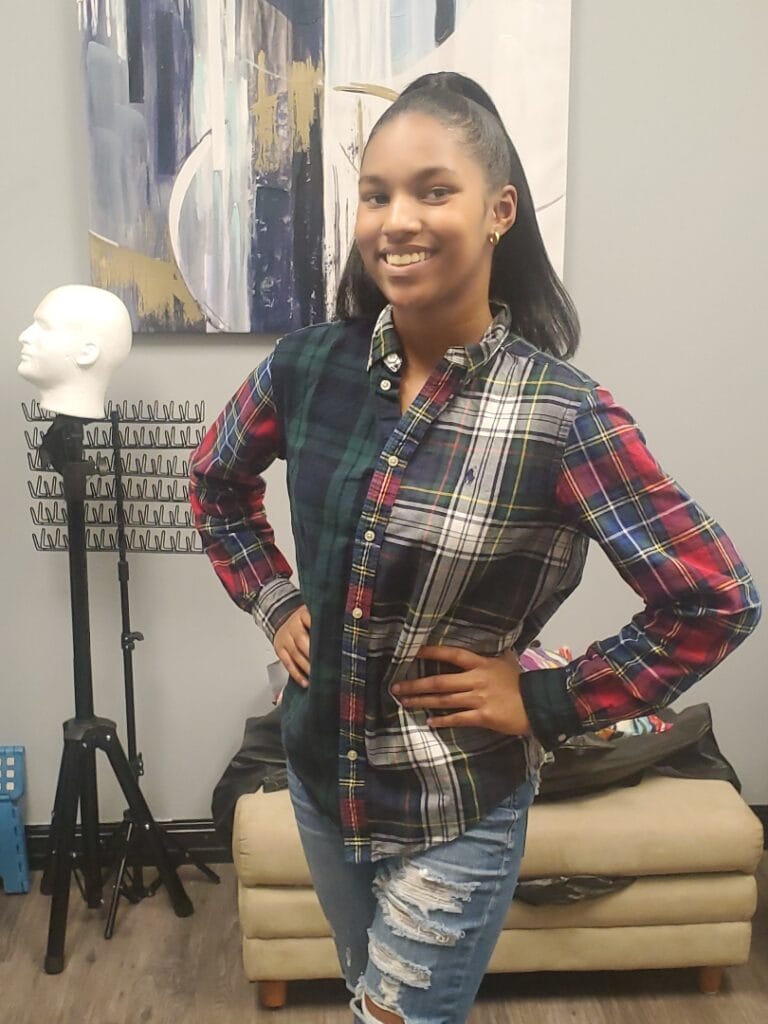 a photo of student laila smiling at the camera.